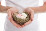 Eggs in heart cupped hands