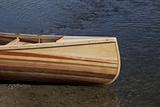 bow of wooden canoe