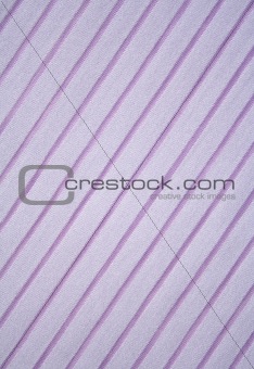 Pink strips on the fabric as background 