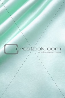 Smooth elegant azure silk as background