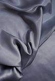 Smooth elegant grey silk as background 