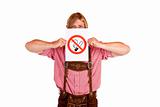Bavarian man in lederhose holds no-smoking-rule sign in front of face
