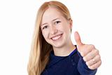 Young beautiful smiling woman shows thumb up