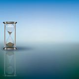 hourglass on blue background