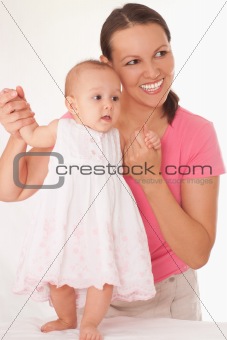 happy mother  holds baby