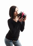 young woman piggy bank front kiss