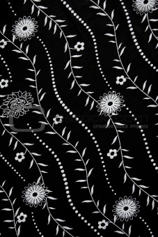 Black fabric with white flower pattern 