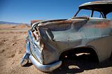 crashed car in the desert