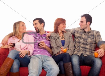 Young Group Sitting on Sofa and Drinking