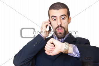 Busy Businessman Talking on Mobile While Looking at Time