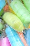 Multicolored silk sugar dessert in plastic bags