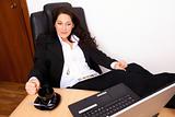 Young woman relaxing at work