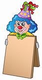 Clown holding information board
