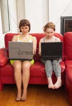 Mom and daughter with computers