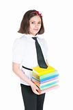 The schoolgirl holds textbooks 