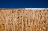 Wooden fence with blue sky