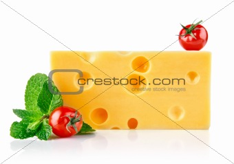 yellow cheese with tomatoes and leaf