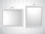 White Picture Frames on Wallpaper Background