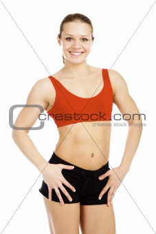 Pretty fitness instructor posing against white background. 