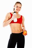 Sports woman holding an apple and bottle of water