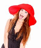 Woman in red hat shows her tongue