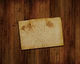 old paper on grunge wood background