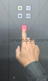 businessman hand press 4 floor in elevator