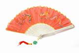 Red Chinese folding fan with dragon and peonix design