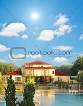 Big summer house with swimming pool in summer