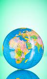 Globalisation concept - globe against gradient colorful backgrou