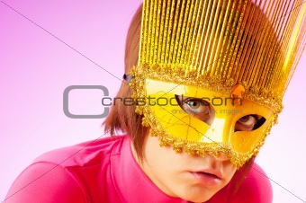 Attractive woman posing in the stylish mask