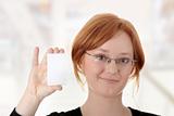 Redhead female person with blank business card