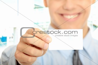 Business man with blank business card