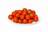 Wet whole tomatos arranged isolated on white