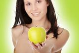 Girl with a green juicy apple
