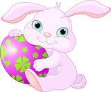 Easter Rabbit holds egg