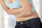 Young teen woman with stomach ache