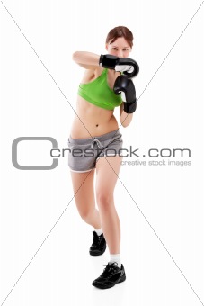 young woman in boxing gloves