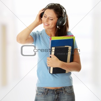 Student girl listening to the music