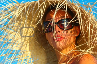 young girl in cane hat