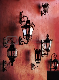 Red wall with lamps