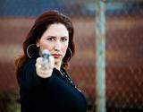 Hispanic Woman with Handgun