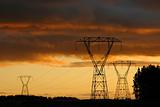 Electric towers and dramatic sunset.
