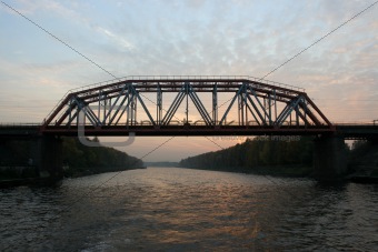 Railway bridge in sunset