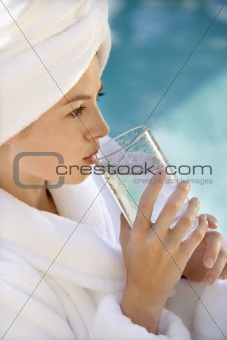 Woman drinking.