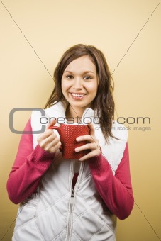 Woman holding  cup.