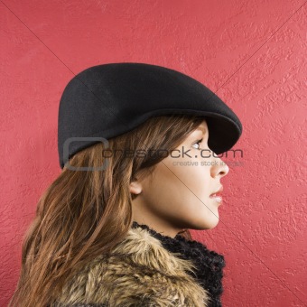 Woman wearing hat.