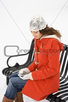 Woman using  PDA.