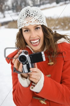 Woman and video camera.