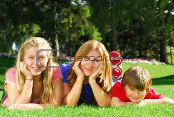 Family relaxing in a park